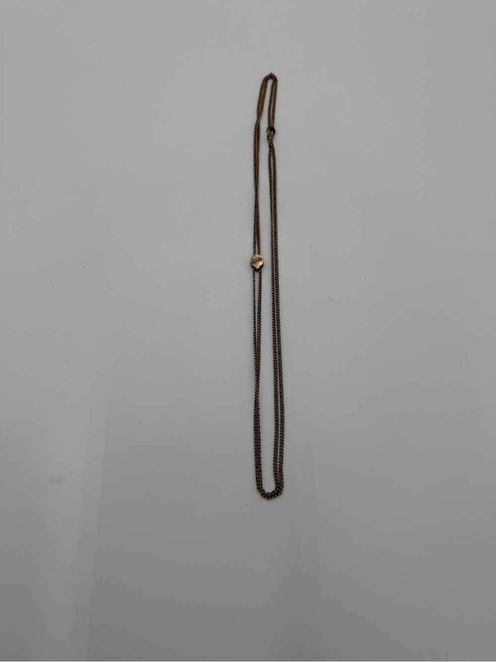 Antique F&C Co. Victorian-era guard chain featuring a gold-filled necklace